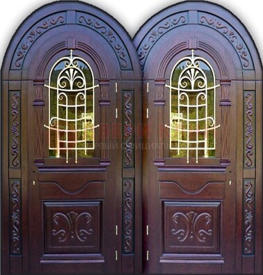 Индивидуальная арочная дверь со стеклом и ковкой ДА-19 в Серпухове
