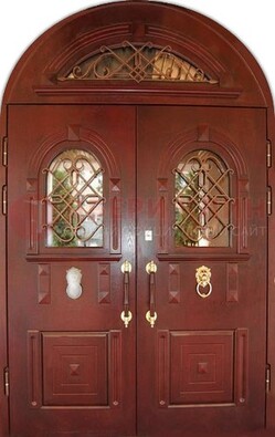 Стальная арочная дверь со стеклом и ковкой ДА-30 в дом из кирпича в Серпухове