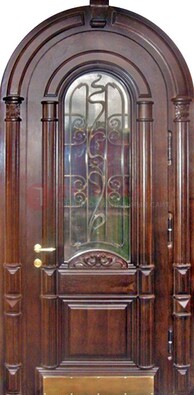 Арочная металлическая дверь массив со стеклом и ковкой ДА-50 в Серпухове