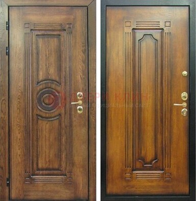 Коричневая металлическая дверь с массивом дуба с рисунком ДМД-10 в Серпухове