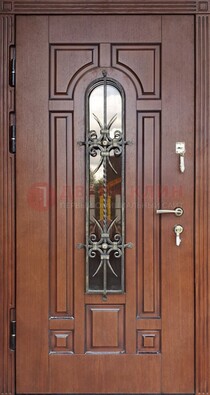 Входная дверь со стеклом и ковкой для частного дома ДСК-188 в Серпухове