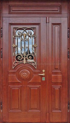 Филенчатая железная дверь со стеклом и ковкой ДСК-204 в Серпухове