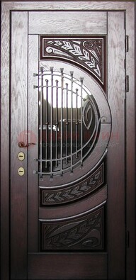 Одностворчатая входная дверь со стеклом и ковкой ДСК-21 в Серпухове