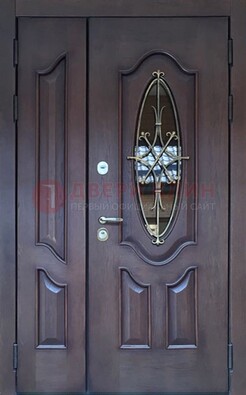 Темная металлическая дверь Винорит со стеклом и ковкой ДСК-239 в Серпухове