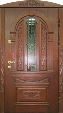 Узорная железная дверь массив со стеклом и ковкой ДСК-247 в Серпухове